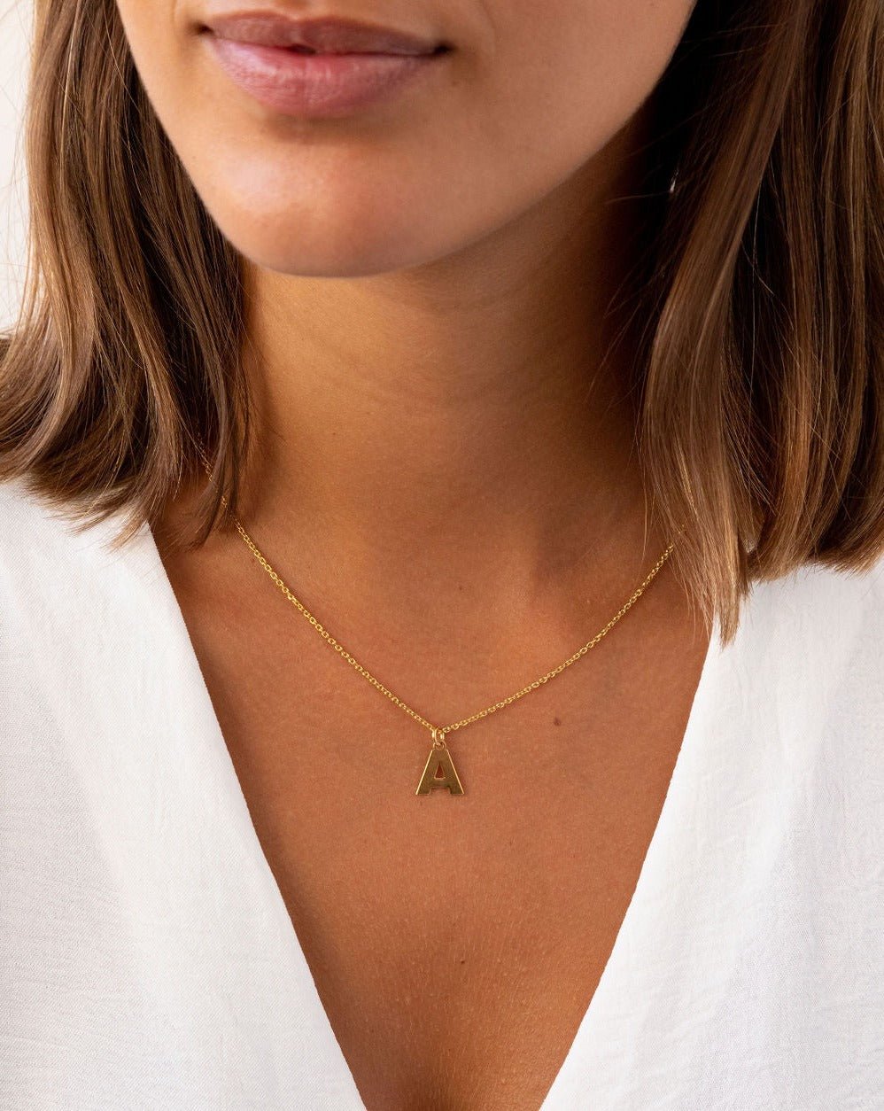 GOLD MIDI INITIAL NECKLACE