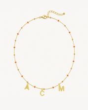 COLLAR BOLITAS CORAL ORO | INICIALES MINI