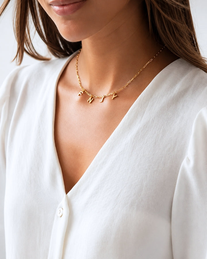 COLLAR ESLABONES ORO | UNA O MÁS INICIALES MINI