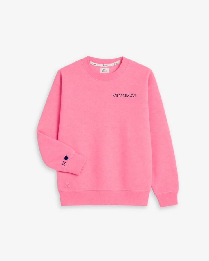 SUDADERA FUCSIA | BORDADO FECHA Y PUÑO