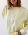 SUDADERA_UNISEX_LIGHT_YELLOW_INICIAL_ANITIALS_1