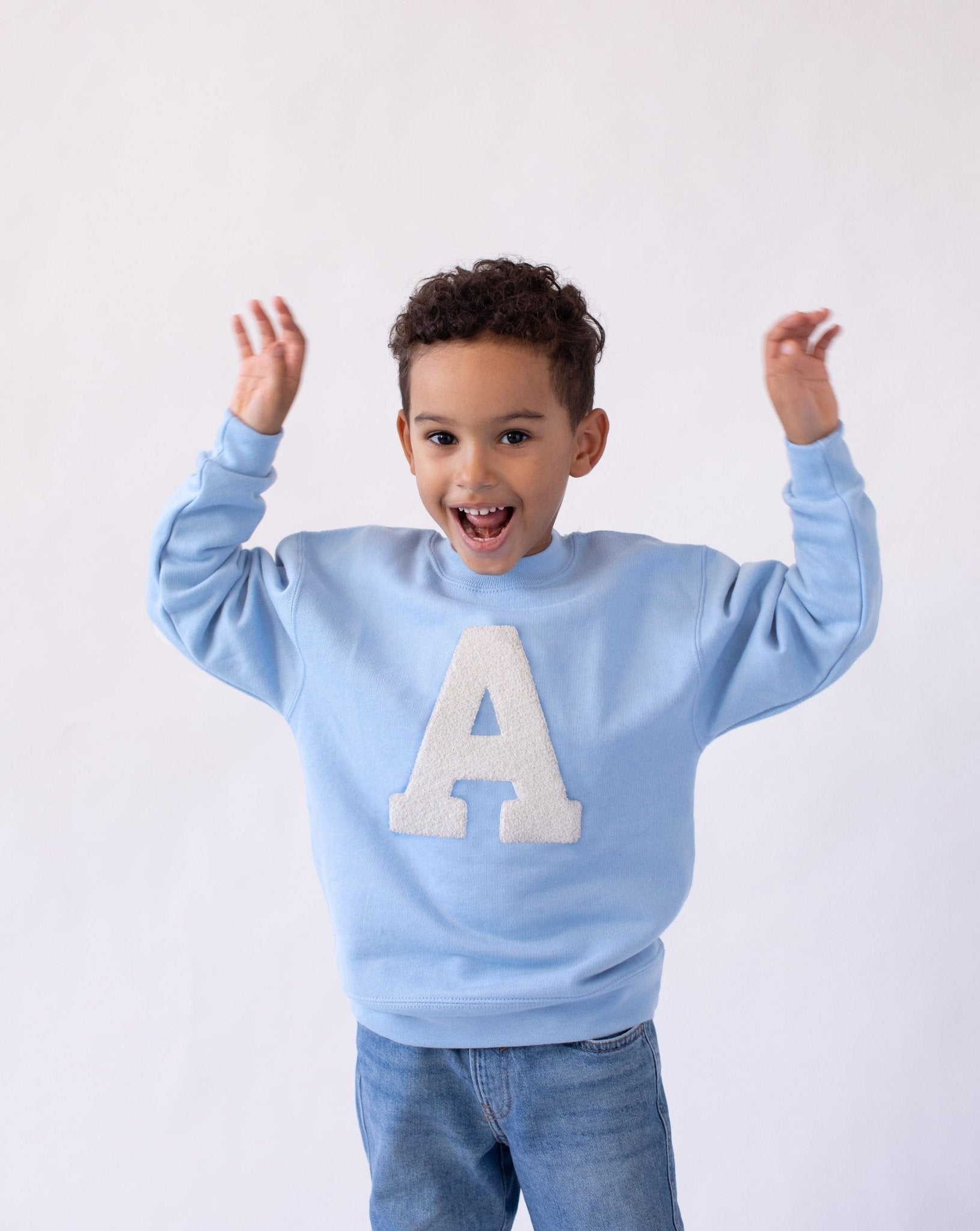 KIDS - LIGHT BLUE SWEATSHIRT | LARGE INITIAL CURL