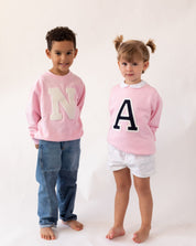 sudadera_light_pink_inicial_centro_Anitials_1