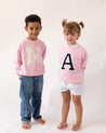 sudadera_light_pink_inicial_centro_Anitials_1