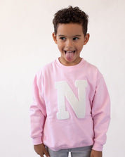 sudadera_light_pink_inicial_rizo_centro_Anitials_2