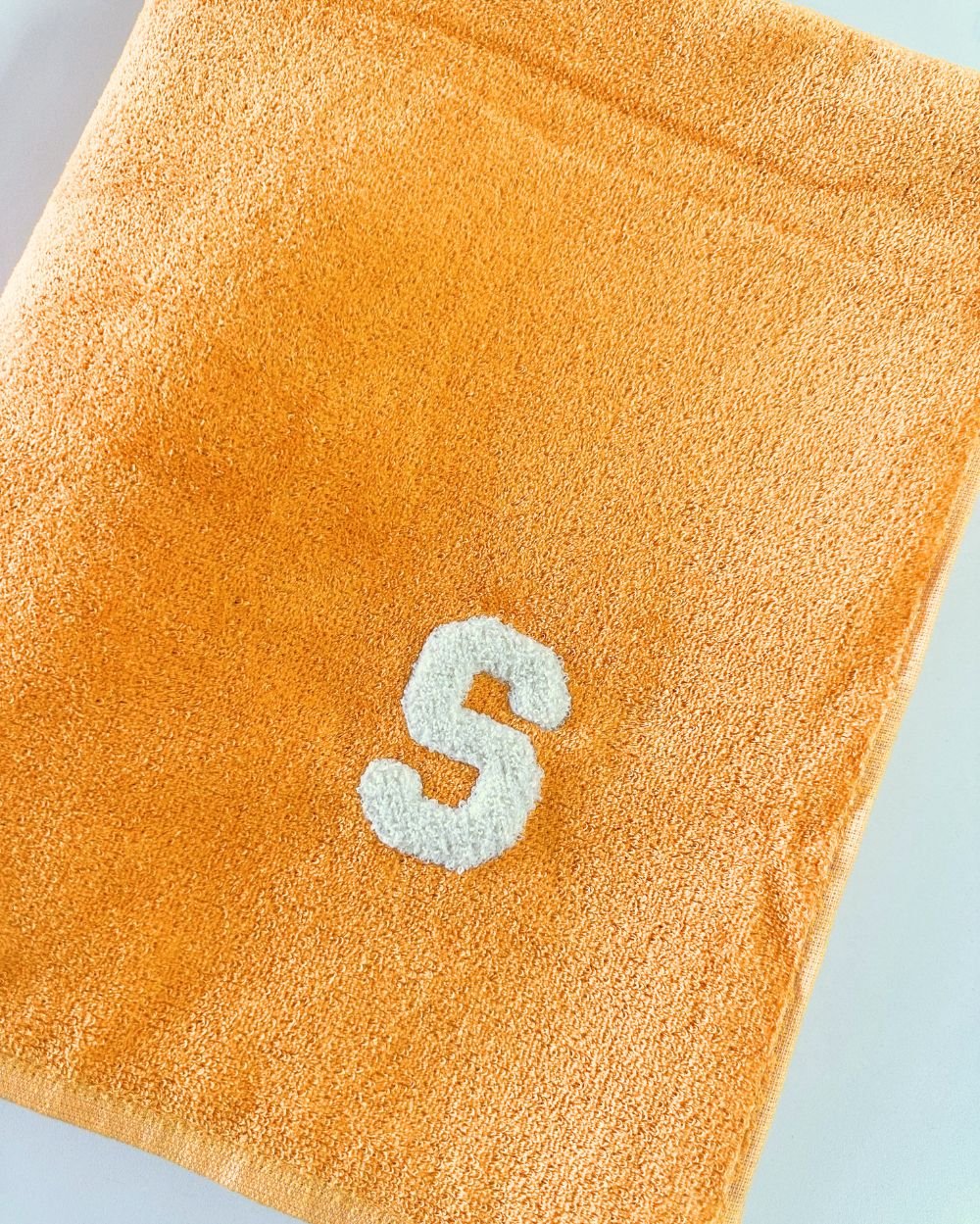 toalla-ambar-inicial-mini